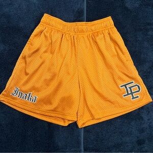 Men’s orange INAKA POWER shorts M